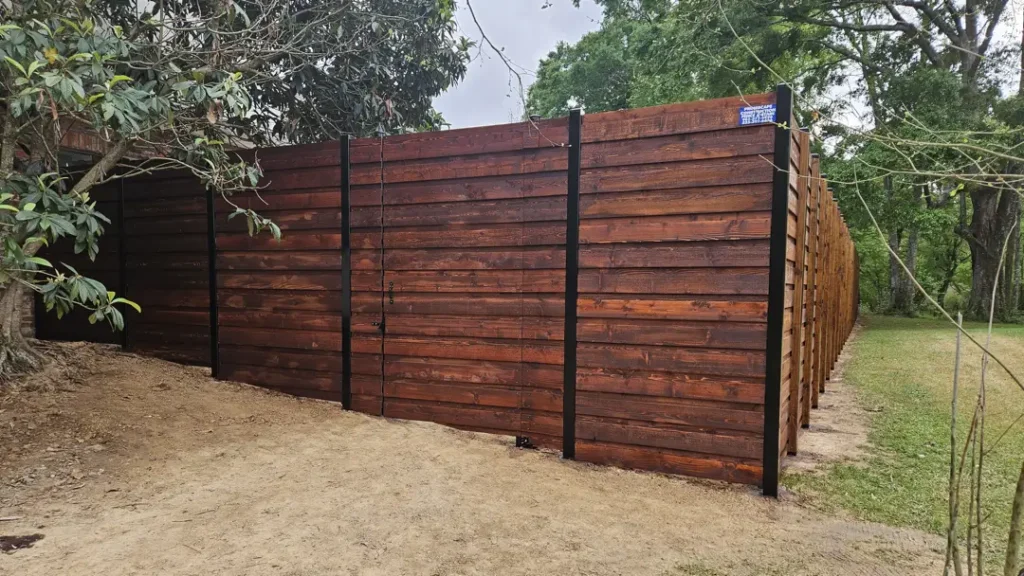 corner view primescape fence wooden stained new installation in denham springs