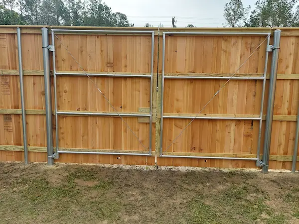 double wooden fence gate installation livingston louisiana