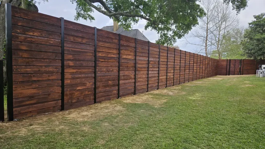 outside primescape fence wooden stained new installation in denham springs