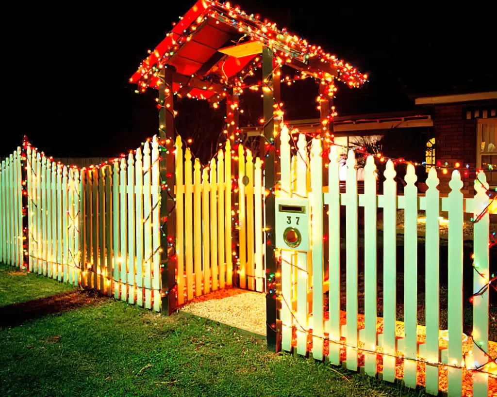 string lights across top of fence christmas decoration