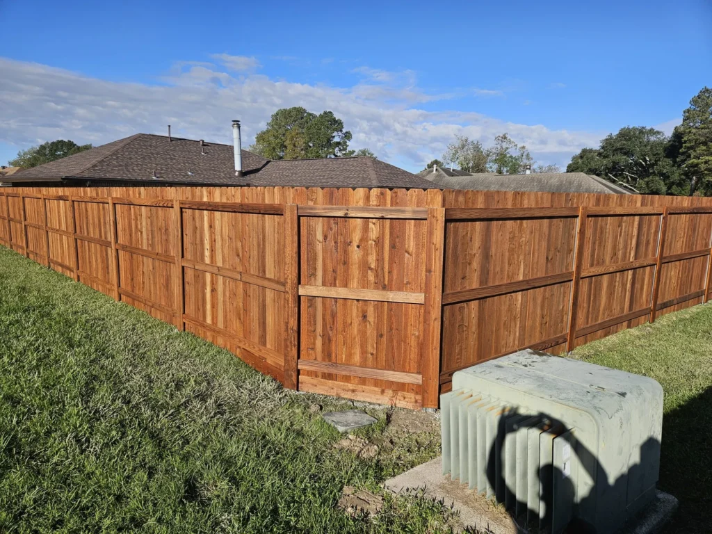 6 foot tall pre stained pecan cedar fence side view